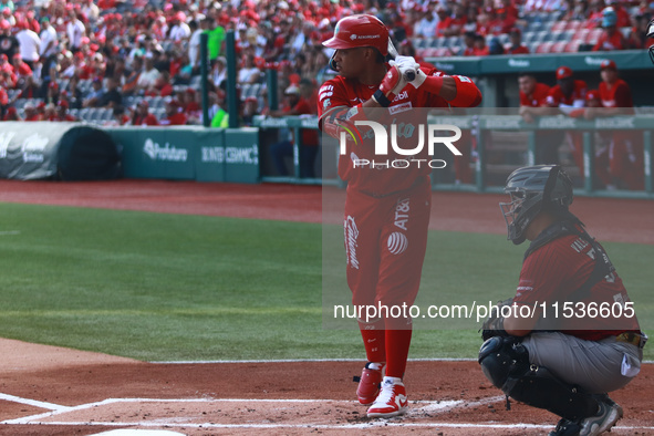 Robinson Cano #22 of Diablos Rojos bats during match 6 of the Mexican Baseball League (LMB) South Zone 2024 championship series against Guer...