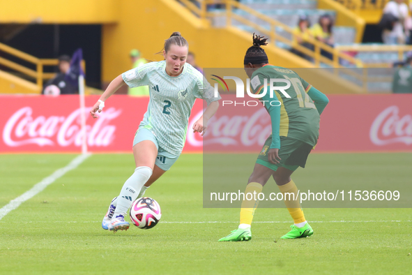 Ngaseh Mbele Berdatte of Cameroon fights for the ball against Michel Fong of Mexico during the FIFA U-20 Women's World Cup 2024 match betwee...