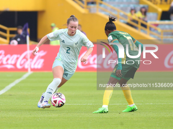 Ngaseh Mbele Berdatte of Cameroon fights for the ball against Michel Fong of Mexico during the FIFA U-20 Women's World Cup 2024 match betwee...