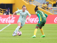 Ngaseh Mbele Berdatte of Cameroon fights for the ball against Michel Fong of Mexico during the FIFA U-20 Women's World Cup 2024 match betwee...