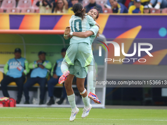 Alice Soto and Montserrat Saldivar of Mexico celebrate a goal during the 2024 FIFA U-20 Women's World Cup match between Cameroon and Mexico...