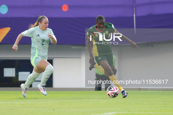 Lamine Mala of Cameroon fights for the ball against Michel Fong of Mexico during the FIFA U-20 Women's World Cup 2024 match between Cameroon...