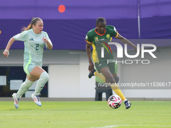 Lamine Mala of Cameroon fights for the ball against Michel Fong of Mexico during the FIFA U-20 Women's World Cup 2024 match between Cameroon...