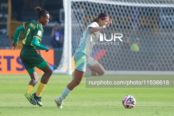 Estelle Yanga Zeh of Cameroon fights for the ball against Montserrat Saldivar of Mexico during the FIFA U-20 Women's World Cup 2024 match be...