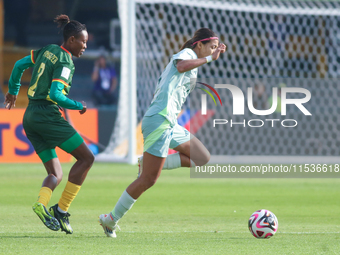 Estelle Yanga Zeh of Cameroon fights for the ball against Montserrat Saldivar of Mexico during the FIFA U-20 Women's World Cup 2024 match be...