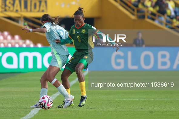 Estelle Yanga Zeh of Cameroon fights for the ball against Montserrat Saldivar of Mexico during the FIFA U-20 Women's World Cup 2024 match be...