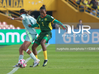 Estelle Yanga Zeh of Cameroon fights for the ball against Montserrat Saldivar of Mexico during the FIFA U-20 Women's World Cup 2024 match be...