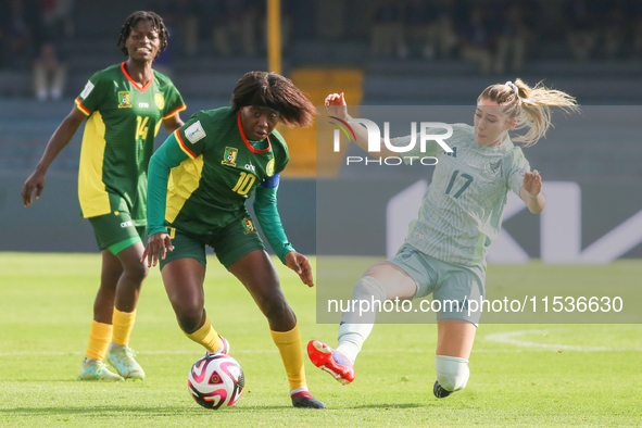 Naomi Eto of Cameroon fights for the ball against Tatiana Flores of Mexico during the FIFA U-20 Women's World Cup 2024 match between Cameroo...