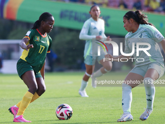 Camilla Daha of Cameroon fights for the ball against Giselle Espinoza of Mexico during the FIFA U-20 Women's World Cup 2024 match between Ca...