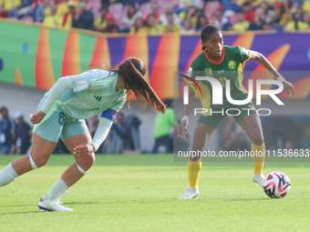 Nicole Ndjock Pouhe of Cameroon fights for the ball against Fatima Servin of Mexico during the FIFA U-20 Women's World Cup 2024 match betwee...