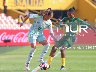 Estelle Yanga Zeh of Cameroon fights for the ball against Valerie Vargas of Mexico during the FIFA U-20 Women's World Cup 2024 match between...