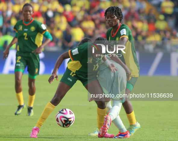 Lamine Mana of Cameroon fights for the ball against Alice Soto of Mexico during the FIFA U-20 Women's World Cup 2024 match between Cameroon...