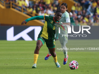 Orline Djutcie Segning of Cameroon fights for the ball against Alice Soto of Mexico during the FIFA U-20 Women's World Cup 2024 match betwee...