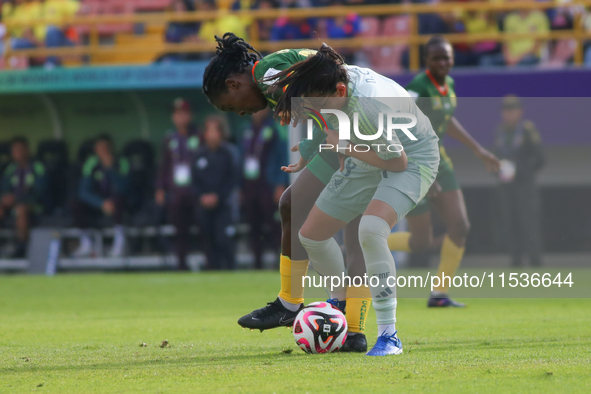 Nina Ngueleu of Cameroon fights for the ball against Natalia Colin of Mexico during the FIFA U-20 Women's World Cup 2024 match between Camer...