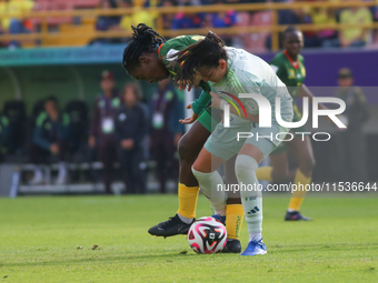 Nina Ngueleu of Cameroon fights for the ball against Natalia Colin of Mexico during the FIFA U-20 Women's World Cup 2024 match between Camer...