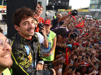 Charles Leclerc of Ferrari ceelbrates with fans after the Formula 1 Italian Grand Prix at Autodromo Nazionale di Monza in Monza, Italy on Se...