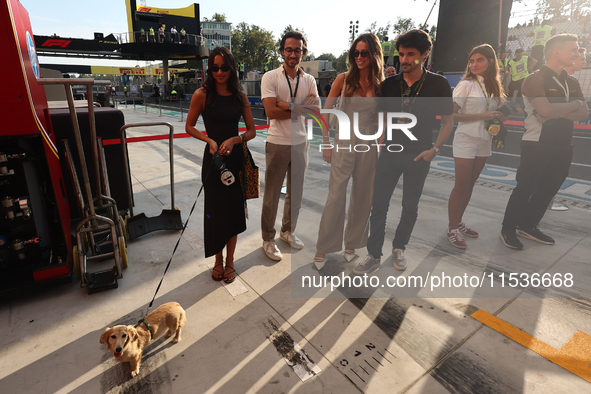 Alexandra Saint Mleux with dog Leo, Charlotte Di Pietro and Lorenzo Tolotta-Leclerc after the Formula 1 Italian Grand Prix at Autodromo Nazi...