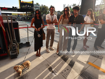 Alexandra Saint Mleux with dog Leo, Charlotte Di Pietro and Lorenzo Tolotta-Leclerc after the Formula 1 Italian Grand Prix at Autodromo Nazi...