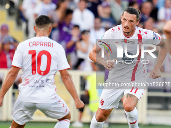 Milan Djuric of AC Monza celebrates after scoring first goal during the Serie A Enilive match between ACF Fiorentina and AC Monza at Stadio...