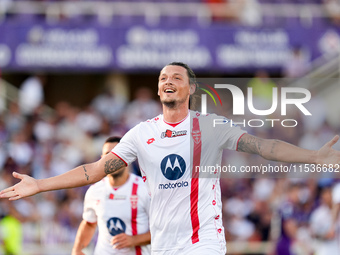 Milan Djuric of AC Monza celebrates after scoring first goal during the Serie A Enilive match between ACF Fiorentina and AC Monza at Stadio...