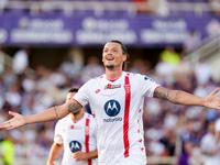 Milan Djuric of AC Monza celebrates after scoring first goal during the Serie A Enilive match between ACF Fiorentina and AC Monza at Stadio...