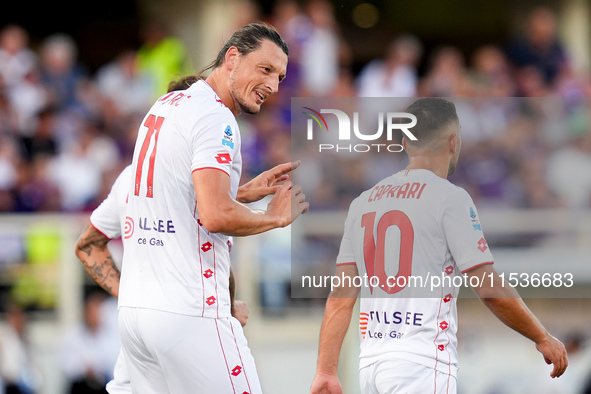 Milan Djuric of AC Monza celebrates after scoring first goal during the Serie A Enilive match between ACF Fiorentina and AC Monza at Stadio...