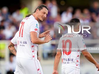 Milan Djuric of AC Monza celebrates after scoring first goal during the Serie A Enilive match between ACF Fiorentina and AC Monza at Stadio...