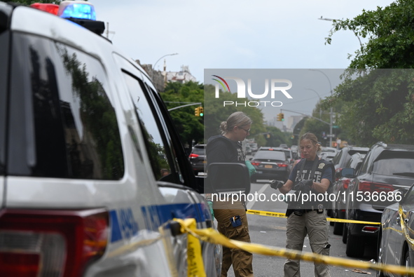 New York City Police Department crime scene unit investigators are at the scene. A 37-year-old male is shot and killed in Brooklyn, New York...