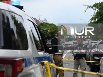 New York City Police Department crime scene unit investigators are at the scene. A 37-year-old male is shot and killed in Brooklyn, New York...