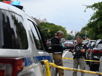 New York City Police Department crime scene unit investigators are at the scene. A 37-year-old male is shot and killed in Brooklyn, New York...