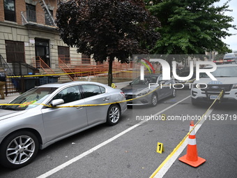 Evidence markers at the crime scene highlight where evidence is found. A 37-year-old male is shot and killed in Brooklyn, New York, United S...