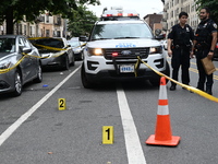 Evidence markers at the crime scene highlight where evidence is found. A 37-year-old male is shot and killed in Brooklyn, New York, United S...