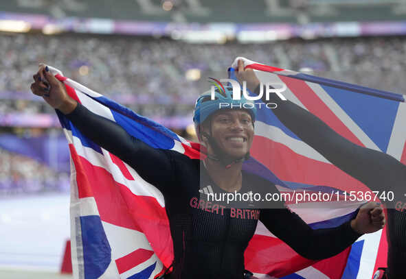 Kare Adenegan of Great Britain celebrates winning silver in Women's 100m - T34 Final during the Paris 2024 Paralympic Games at Stade de Fran...