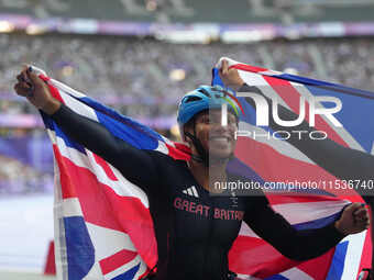 Kare Adenegan of Great Britain celebrates winning silver in Women's 100m - T34 Final during the Paris 2024 Paralympic Games at Stade de Fran...