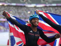 Kare Adenegan of Great Britain celebrates winning silver in Women's 100m - T34 Final during the Paris 2024 Paralympic Games at Stade de Fran...