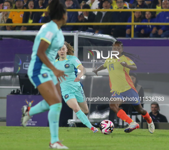 Sintia Cabezas of Colombia fights for the ball against Sasha Grove of Australia during the 2024 FIFA U-20 Women's World Cup match between Co...