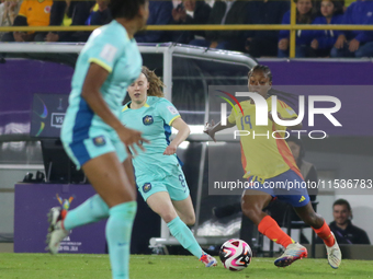 Sintia Cabezas of Colombia fights for the ball against Sasha Grove of Australia during the 2024 FIFA U-20 Women's World Cup match between Co...