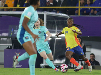 Sintia Cabezas of Colombia fights for the ball against Sasha Grove of Australia during the 2024 FIFA U-20 Women's World Cup match between Co...