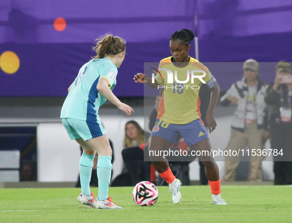 Linda Caicedo of Colombia fights for the ball against Sasha Grove of Australia during the 2024 FIFA U-20 Women's World Cup match between Col...