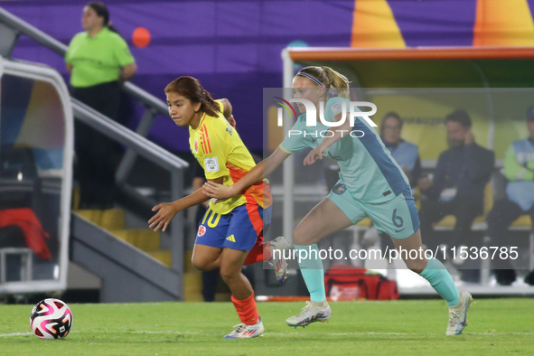 Gabriela Rodriguez of Colombia fights for the ball against Zara Kruger of Australia during the 2024 FIFA U-20 Women's World Cup match betwee...