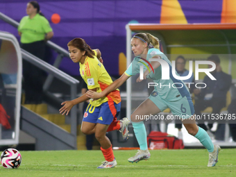 Gabriela Rodriguez of Colombia fights for the ball against Zara Kruger of Australia during the 2024 FIFA U-20 Women's World Cup match betwee...