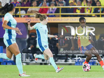 Linda Caicedo of Colombia fights for the ball against Sasha Grove of Australia during the 2024 FIFA U-20 Women's World Cup match between Col...