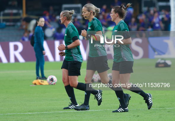 Female referees officiate the FIFA U-20 Women's World Cup match between Colombia and Australia at the El Campin stadium in Bogota, Colombia,...