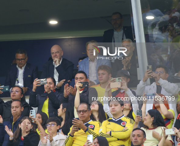 Gianni Infantino (L), Ramon Jesurun, and former Colombian President Ivan Duque (R) during the FIFA U-20 Women's World Cup 2024 match between...