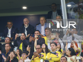 Gianni Infantino (L), Ramon Jesurun, and former Colombian President Ivan Duque (R) during the FIFA U-20 Women's World Cup 2024 match between...