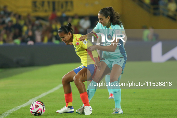 Juana Ortegon of Colombia fights for the ball against Jynaya Dos Santos of Australia during the 2024 FIFA U-20 Women's World Cup match betwe...