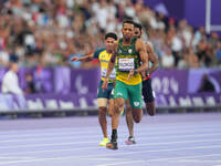 Mpumelelo Mhlongo of South Africa celebrates winning gold in Men's 100m - T44 Final during the Paris 2024 Paralympic Games at Stade de Franc...