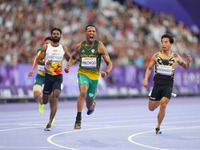 Mpumelelo Mhlongo of South Africa celebrates winning gold in Men's 100m - T44 Final during the Paris 2024 Paralympic Games at Stade de Franc...