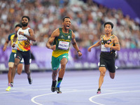 Mpumelelo Mhlongo of South Africa celebrates winning gold in Men's 100m - T44 Final during the Paris 2024 Paralympic Games at Stade de Franc...