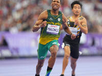 Mpumelelo Mhlongo of South Africa celebrates winning gold in Men's 100m - T44 Final during the Paris 2024 Paralympic Games at Stade de Franc...